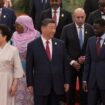 China's President Xi Jinping and his wife Peng Liyuan get ready to pose for a group photo together with leaders from African countries before a welcome dinner at the Forum on China-Africa Cooperation (FOCAC)