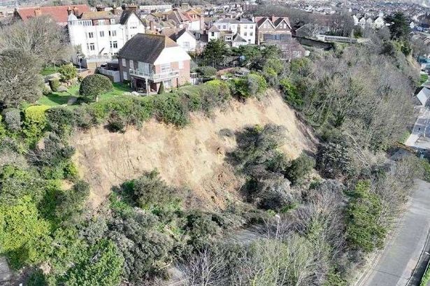 'My house sits on edge of landslide cliff - but I won't move'