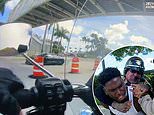 Moment Tyreek Hill speeds past Miami police officer - who then stopped and dragged NFL star to the ground before Dolphins game