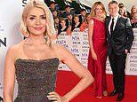 Holly Willoughby's red carpet return! ITV star sparkles at the National Television Awards as she joins This Morning successors Cat Deeley and Ben Shepherd at telly's big night out