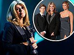 Kate Garraway gives an emotional speech with her children by her side as she accepts the best Documentary gong for Derek's Story at the NTAs