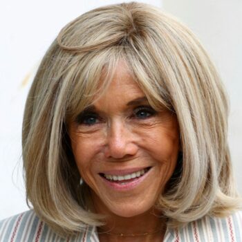 Brigitte Macron, who was mentioned in the first season of Emily In Paris, now puts in an appearance in person. Pic: AP