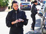 Annie Kilner cuts a sporty figure as she is seen for the first time since it was revealed husband Kyle Walker has moved back into marital home to repair relationship