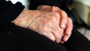 File photo dated 07/10/13 of the hands of an elderly woman at home. Councils are struggling to meet rising requests for adult social care support and some people are cutting back on their home care amid the cost-of-living crisis while "completely overwhelmed" family carers try to fill the gaps, the health watchdog has said. Issue date: Friday October 20, 2023.