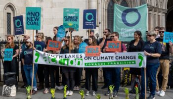 Campaigners against the proposed Whitehaven coal mine outside court during the hearing in July. Pic: Friends of the Earth