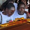 Rebecca Cheptegei's mother breaks down in tears beside her daughter's coffin as it makes final journey to Uganda after Olympic runner was burned alive by ex-boyfriend