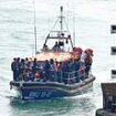 Tragedy in English Channel as at least eight migrants are killed in crossing disaster... but MORE boats set off as 'bodies are being brought up the ramp'