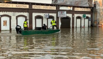 Boats better than cars in Polish town where floods have damaged 80% of homes