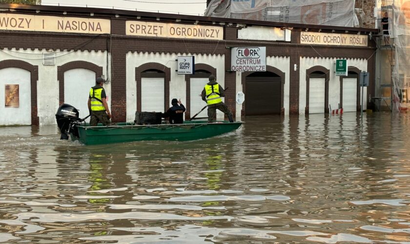 Boats better than cars in Polish town where floods have damaged 80% of homes