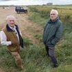 Furious villagers locked in bitter three-way legal battle over ancient grazing rights are 'left penniless' - while council, golf club and National Trust rake in £200,000