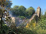 'Unimagineable' explosion destroys pretty bungalow as woman is airlifted to hospital and family dog survives unharmed