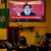 People watch the speech of Hezbollah leader Hassan Nasrallah as they sit in a cafe in the southern suburbs of Beirut, Thursday, Sept. 19, 2024. (AP Photo/Hassan Ammar)