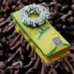 Hezbollah members carry the coffin of their comrade who was killed on Wednesday when a handheld device exploded, during a funeral procession in the southern suburbs of Beirut, Thursday, Sept. 19, 2024. (AP Photo/Hussein Malla)