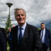 Le Premier ministre Michel Barnier (c) après une viste à l'Institut national de l'énergie solaire (Ines) au Bourget-du-Lac, le 12 septembre 2024 en Savoie