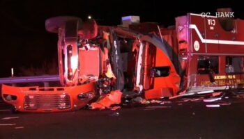 8 California firefighters rushed to hospital after fire truck flips on freeway