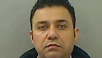 Head of smuggling gang who brought hundreds of people into the UK jailed - but remains at large