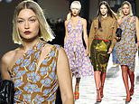 Gigi Hadid storms the Versace runway in an asymmetrical floral dress as she joins Vittoria Ceretti and Iris Law on the catwalk at Milan Fashion Week