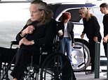 Ozzy Osbourne looks frail in LA with wife Sharon - after she said his health has delayed their move to England