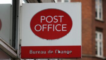 Signage at a Post Office branch in Westminster, London, Britain, March 12, 2024. REUTERS/Hollie Adams