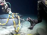 New video showing deep-sea salvage of Titan sub is released as OceanGate employee hits back at accusations there was a 'desperation' to complete dives in doomed vessel