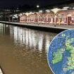 UK weather: Train station is left looking like Venice canal, stranded drivers are saved and dozens of campers are rescued from camp site - with warning of more downpours today