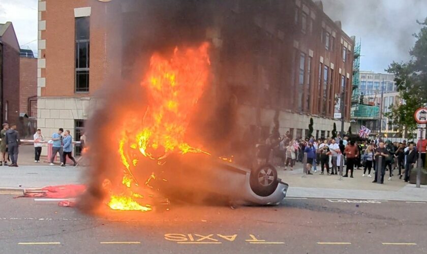 A car burns during anti-immigration demonstrations in Sunderland, Britain August 2, 2024 in this still image obtained from a social media video. TikTok @whatsthecracklike/via REUTERS THIS IMAGE HAS BEEN SUPPLIED BY A THIRD PARTY. MANDATORY CREDIT. NO RESALES. NO ARCHIVES.