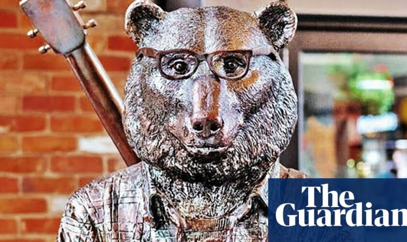 Artists ‘absolutely heartbroken’ after $60,000 bike-riding bear statue stolen from Melbourne laneway