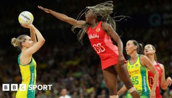 England's Funmi Fadoj challenging Australia's Kiera Austin.