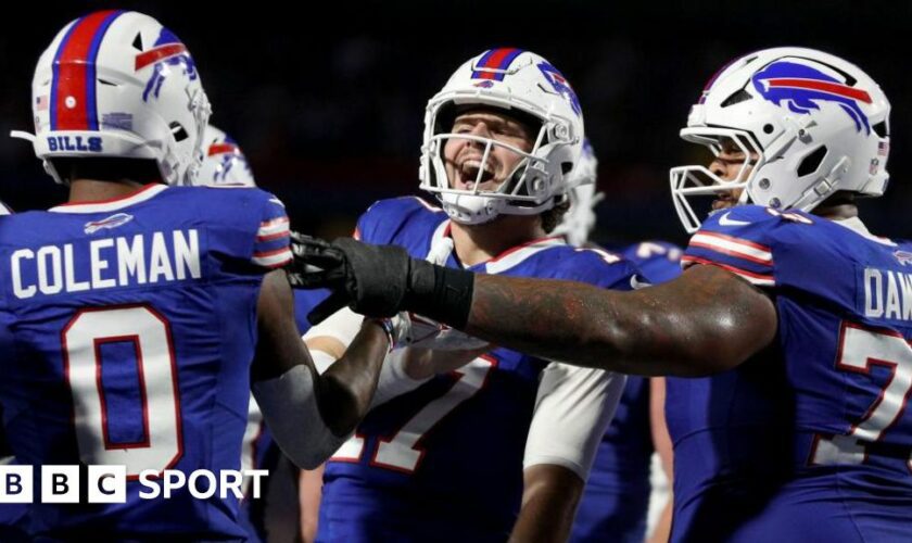 Josh Allen celebrating a touchdown with his team-mates