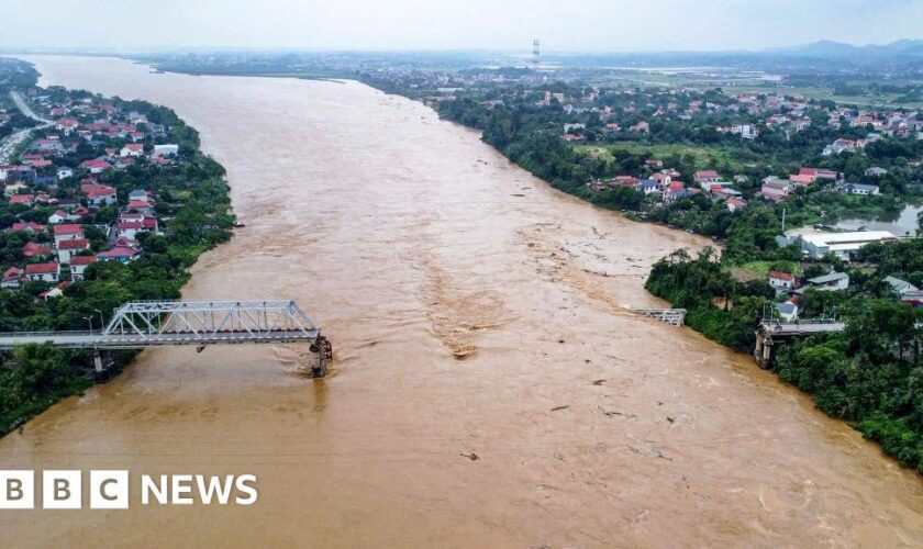 Cars plunge into river as super typhoon destroys Vietnam bridge