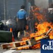 Dozens injured and 39 arrested in fiery confrontations between weapons expo protesters and police in Melbourne