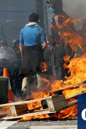 Dozens injured and 39 arrested in fiery confrontations between weapons expo protesters and police in Melbourne