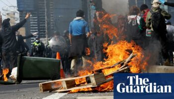 Dozens injured and 39 arrested in fiery confrontations between weapons expo protesters and police in Melbourne