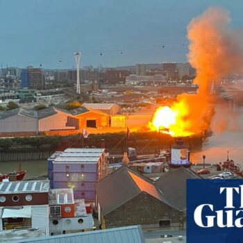 Fire crews tackle blaze after ‘pre-planned’ film set explosions near the O2