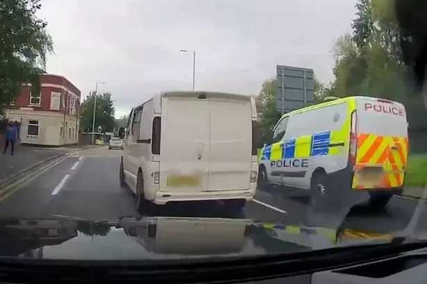 Harrowing moment police van slams into elderly woman in her 80s crossing the road