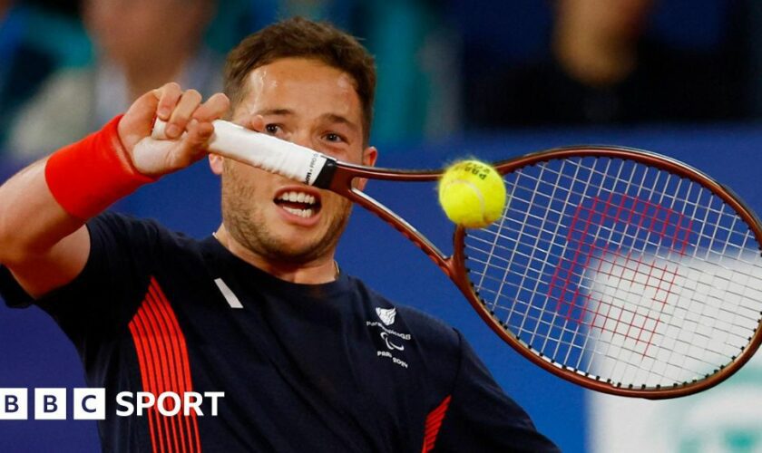 Alfie Hewett plays a backhand in the Paralympic gold-match medal