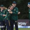 Ireland's cricketers celebrate a wicket v England