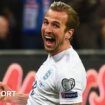 Harry Kane celebrates scoring on his England debut