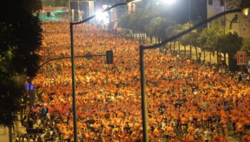 La noche sevillana se enciende con la Carrera Nocturna más multitudinaria