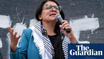 Rashida Tlaib condemns cartoonist for racist image of her with exploding pager