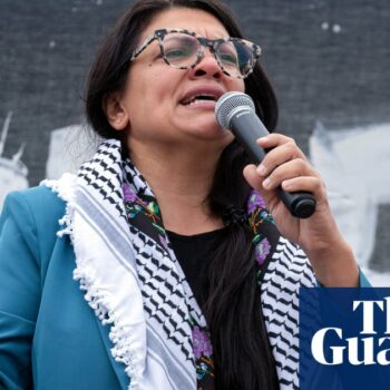 Rashida Tlaib condemns cartoonist for racist image of her with exploding pager