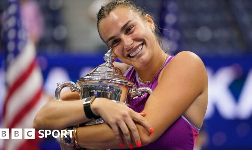 Aryna Sabalenka hugs US Open trophy