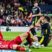 Scotland's Grant Hanley concedes a penalty against Poland