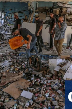 Six Unrwa workers among estimated 14 killed in Israeli strike on Gaza school sheltering displaced