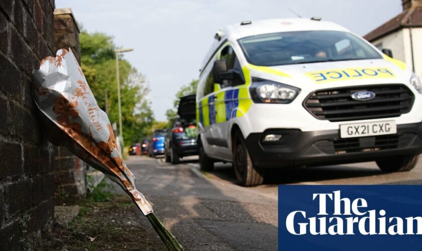 Surrey police confirm man and three young children found dead in house