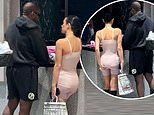 Kanye West and Bianca Censori look glum in their LAST picture together before shock 'split' was made public - as the 'real reason behind their break-up is revealed'