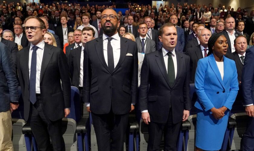 (left to right) Tory leadership candidates Tom Tugendhat, James Cleverly, Robert Jenrick and Kemi Badenoch singing the national anthem during the Conservative Party Conference at the International Convention Centre in Birmingham. Picture date: Wednesday October 2, 2024. PA Photo. See PA story POLITICS Tories. Photo credit should read: Stefan Rousseau/PA Wire