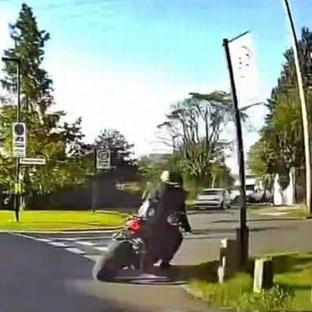 Car passenger flung to ground 'by motorcyclist in road rage hit-and-run attack'