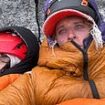 Dramatic new video shows shivering climbers stuck on an icy ledge at 21,000ft - here's how they survived