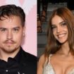 Dylan Sprouse supports Barbara Palvin at Victoria’s Secret Fashion Show with cardboard cutouts of their pets